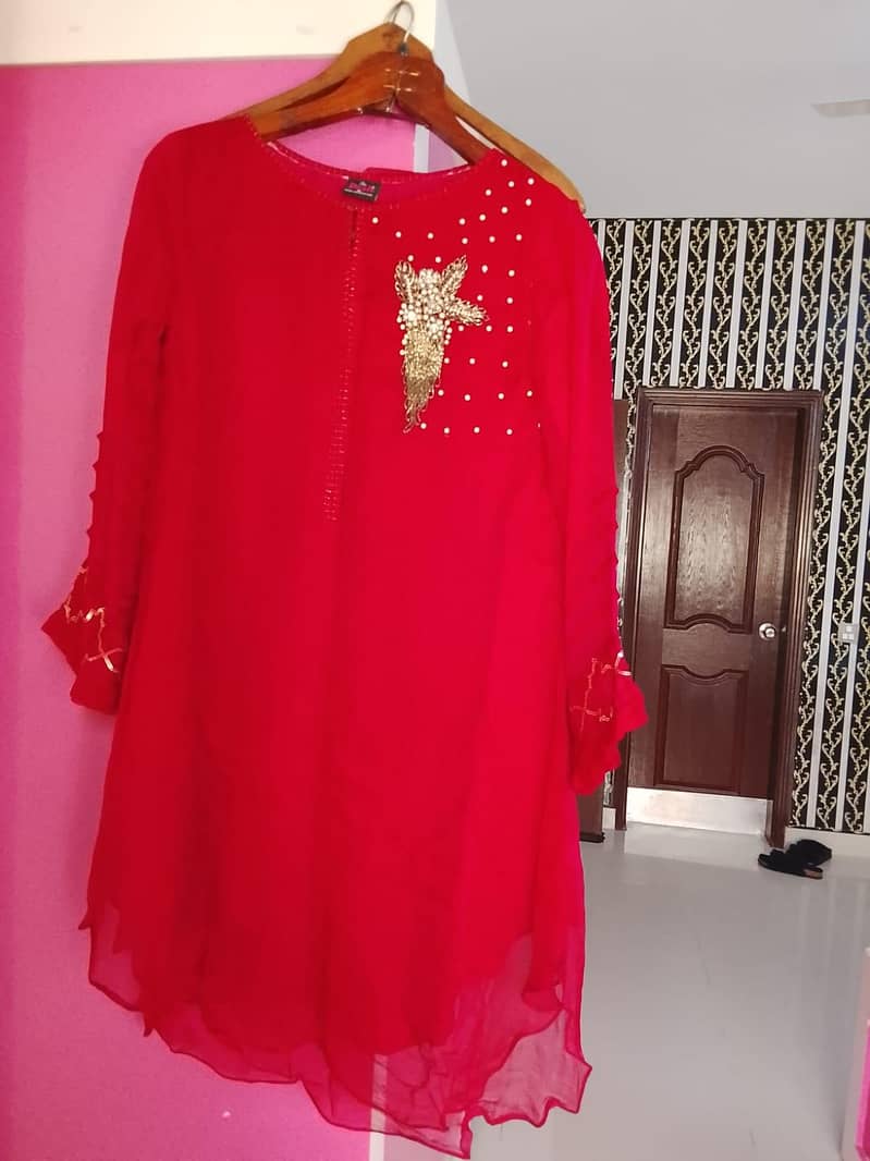 3 pc Lawn and 3 pc chiffon suit Each suit costs 3000 2