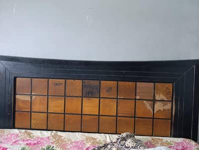 one wooden bed. . tood heavy strong and sturdy. .
