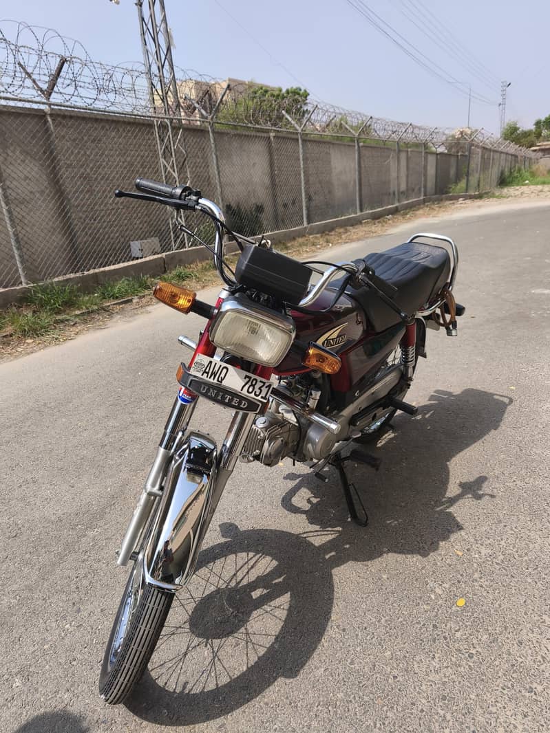 United 70cc 4