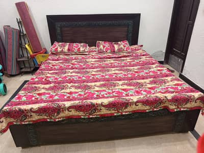 wooden bed with mattress in best condition