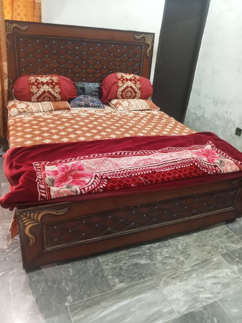 one bed and two side table 0