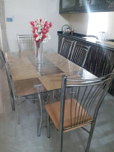 Glass Top Dinning Table with Metal frame and 6 Chairs
