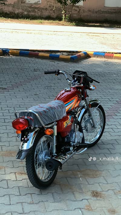 HONDA 125 RED COULER