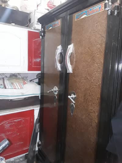 2 door wardrobe 1 door is damage and 1 handle is looz not damaged