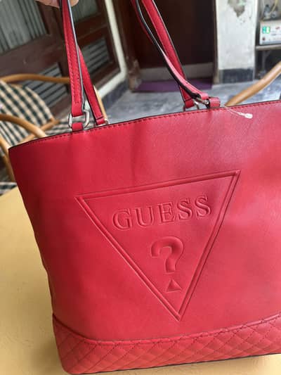 GU£ss org like new perfect