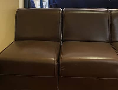 2-Piece Brown Leather Sofa Set – Good Condition