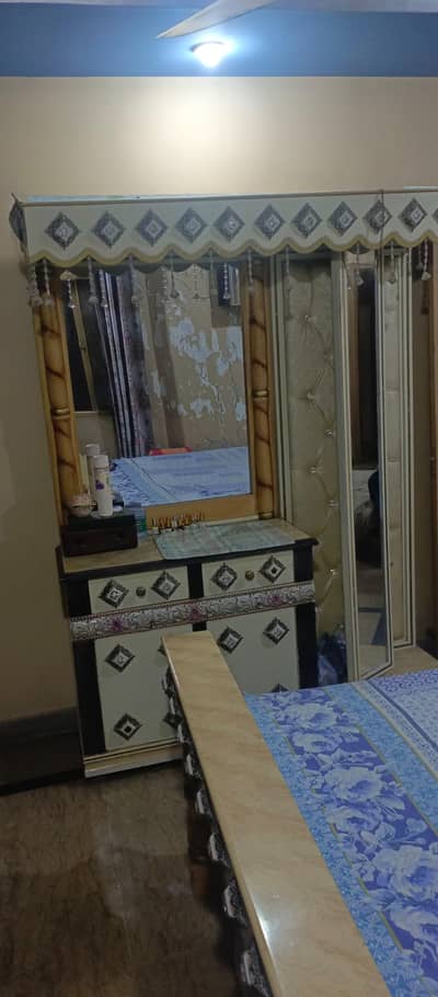complete bed set 2 sidetables Dressing table and king size bed.