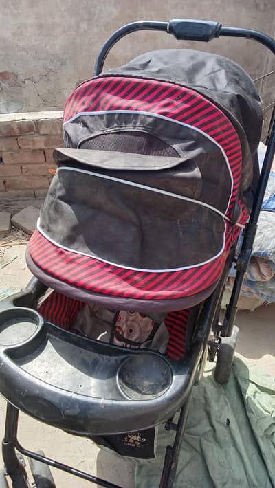 Baby stroller folding with try good condition Multan