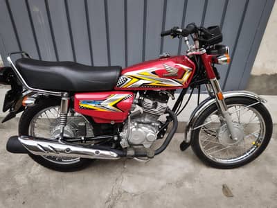 Honda 125.  model 25 total geninue head side pack grantee