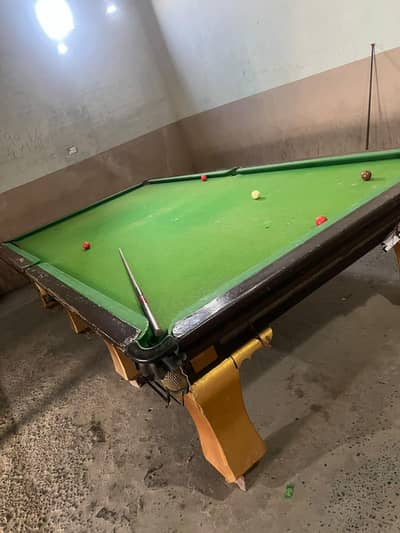 2 snooker tables and 1 hand bal