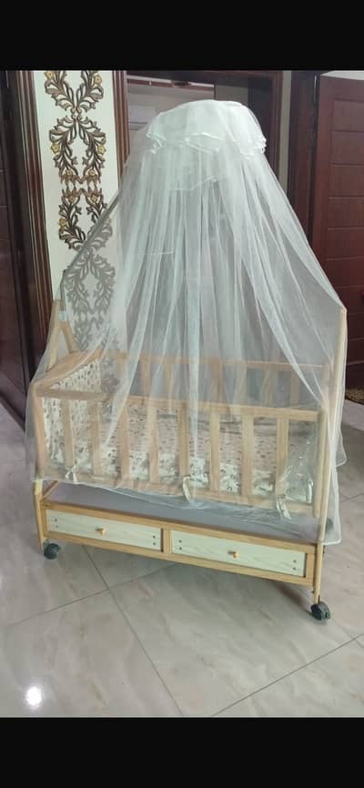 wooden baby cot and cradling swing