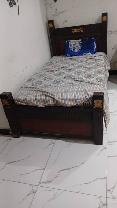 wooden single bed