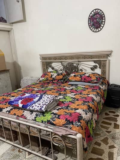 Bed with mattress and sofa