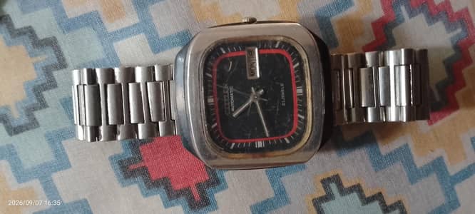 citizan. . . richo. . siko 5. . . .  Dr Darvin  all automatic watch