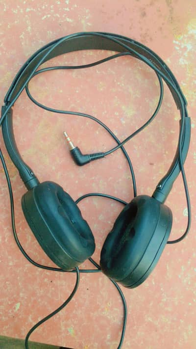 Headphones also attached with small phone
