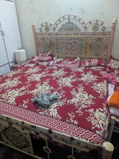 white bed with all atem