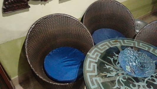 4 round cane sofa and also table with double partt