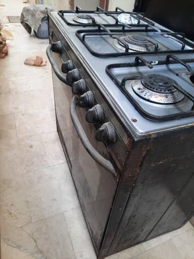 Five burner gas cooking range with backing  oven for sale