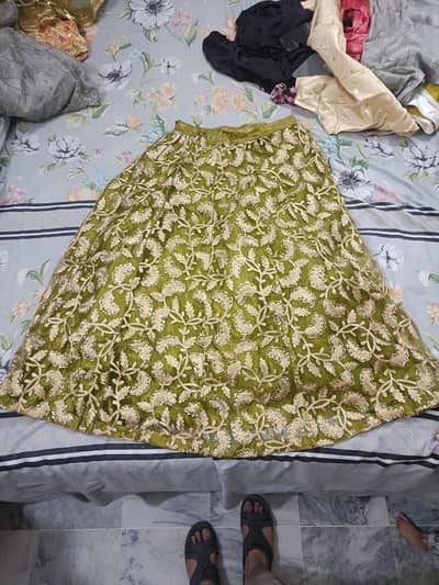 Urgent Sale – Heavy Embroidered Green & Gold Lehenga with Cream Shirt