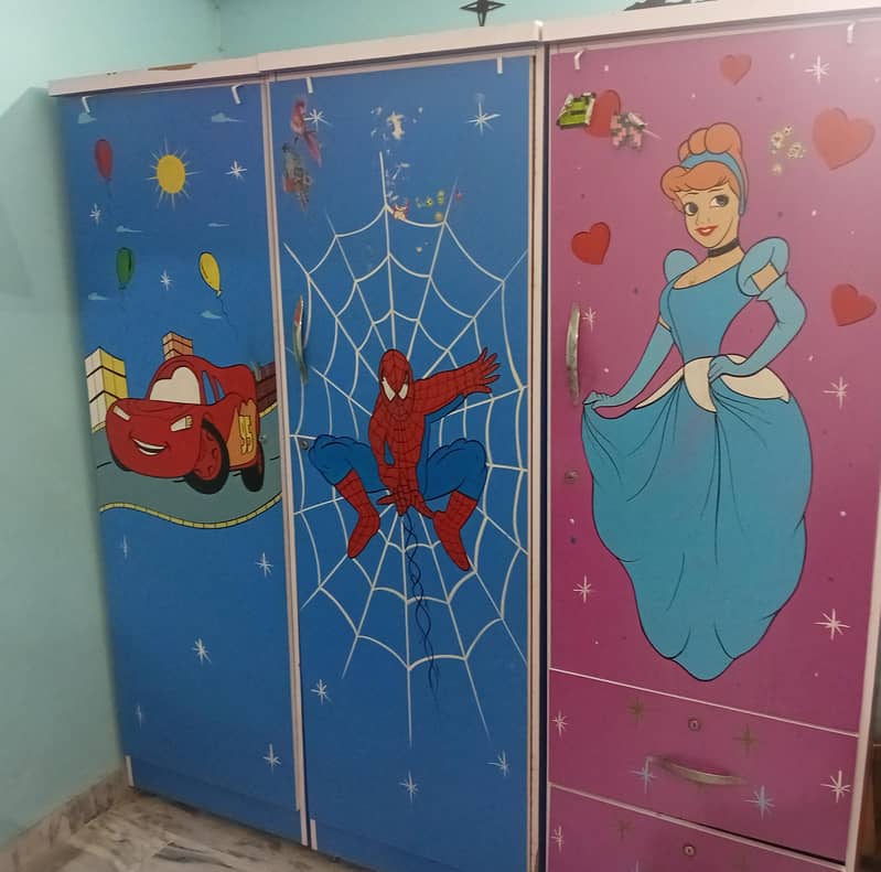 three children's wardrobe 0