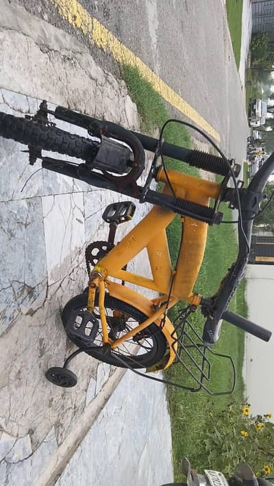 yellow kids bicycle