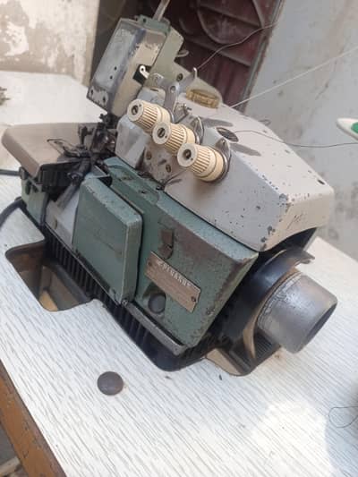 piko machine L52 or Siruba embossed