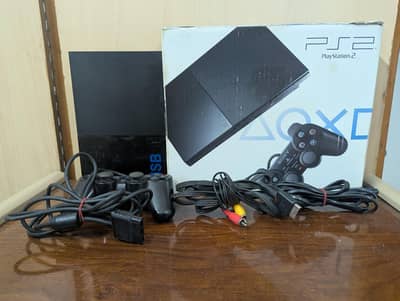 Sony PS2 Slim boxed with manual, controller and complete cables