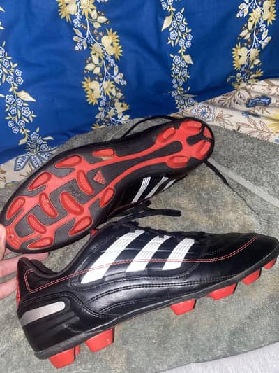 Adidas Predator X TRX FG soccer cleats.