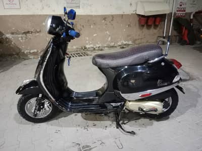 Ramza scooter 100cc petrol variant