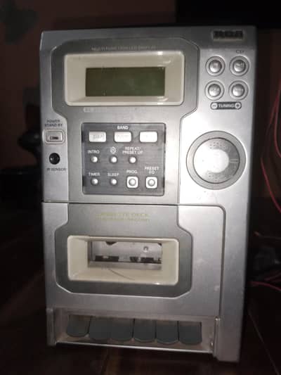 cassette and c. d audio player with speakers