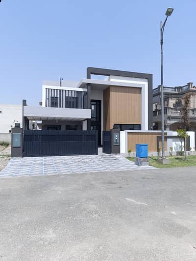 SYED BROTHERS PROUDLY OFFERS: 1-Kanal Elegant And Fully Maintained Modern Bungalow Facing Park Is Available In The Best Block Of DHA Lahore.