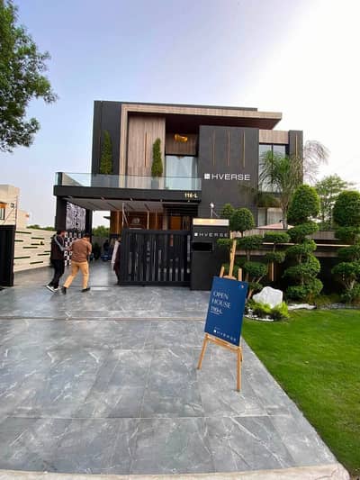 SYED BROTHERS PROUDLY OFFERS: 1-Kanal Elegant And Fully Furnished Bungalow With Basement, Pool, Lift, Cinema Is Available In The Best Block Of DHA Lahore.