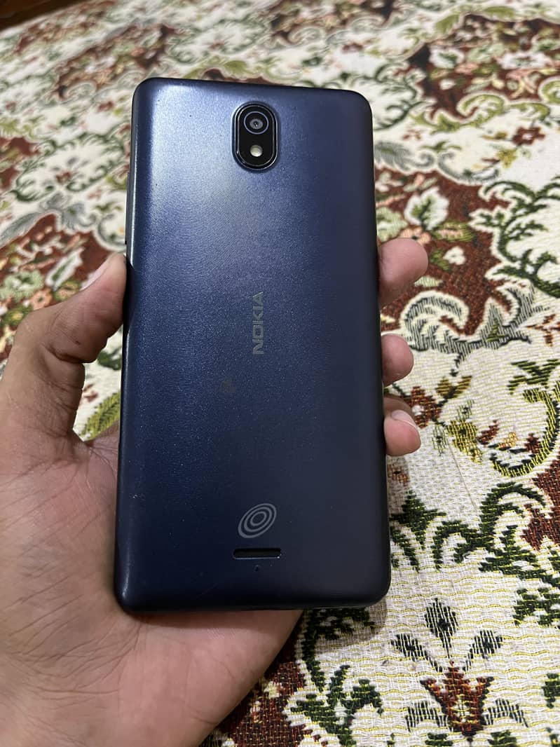 Nokia C100 1