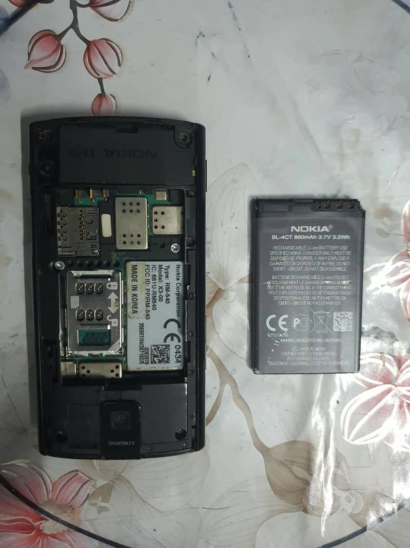 Nokia X3 8
