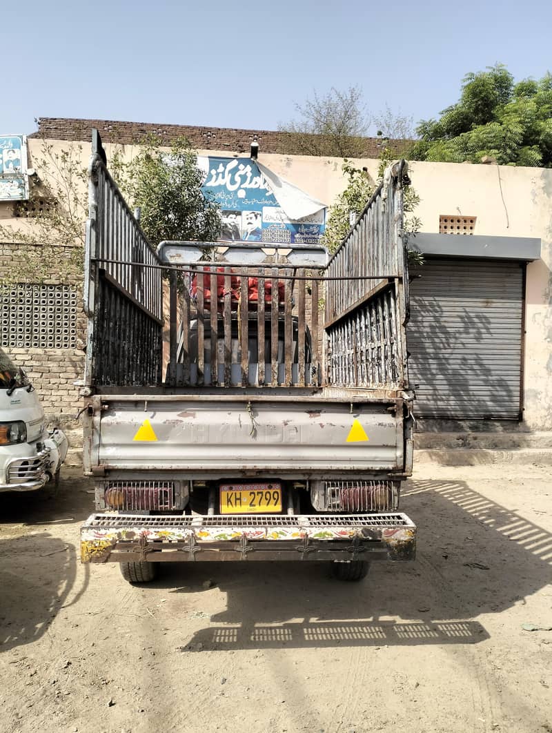 شہزور 2000ماڈل اندر سے چینین باہر سے شاورحصہ بڑا 2