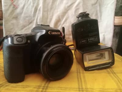 Canon 70 with 50mm  and Godas tt560ii flash gun