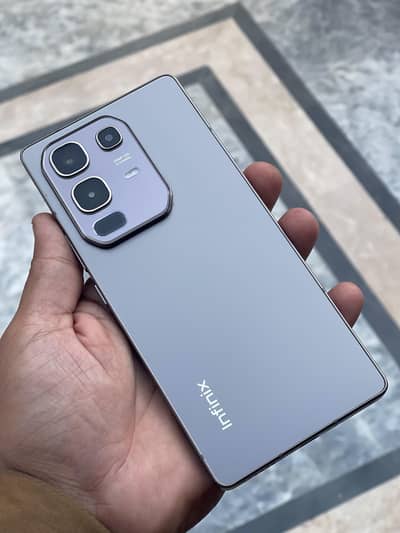 Infinix Note 50 mobile and charger