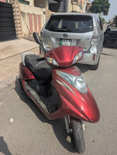 united petrol scooty