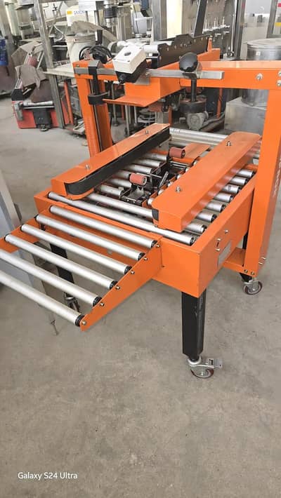 Automatic Box Sealing and Packaging – Carton Tape & Strapping Machine