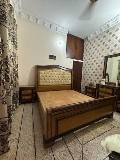 King size bed with side tables and dressing