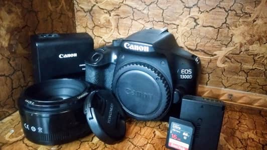 CANON 1300D with 50mm yn lens f1.8 complete accessories