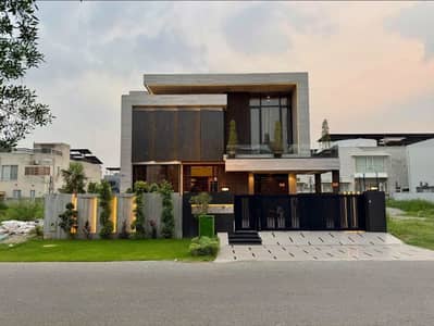 One Kanal Brand New Luxury Ultra-Modern Design Most Beautiful Fully Furnished Bungalow 2 Servant Quarter In Basement For Sale At Prime Location Of DHA Lahore Near To Park Masjid & Commercial Market.