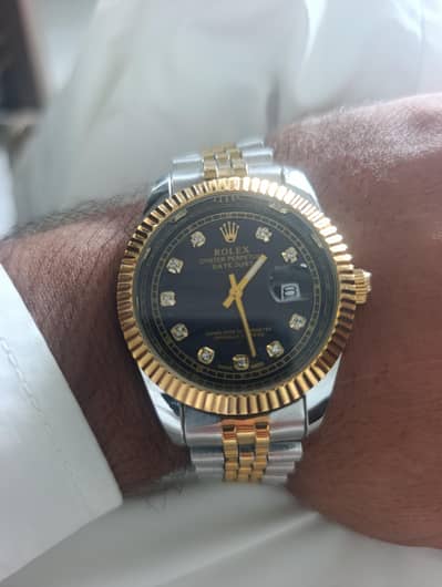 urjent for sale rolekx Date and time watch. . . . .