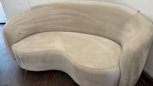 curved, half-moon sofa