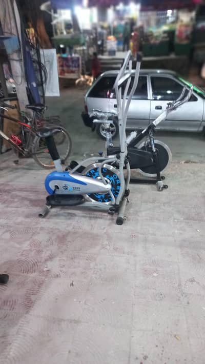 Steel wheel elliptical cycle exercise cycling machine cross trainer