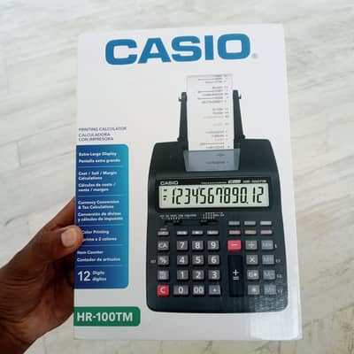 Casio HR-100TM model calculator printing printer