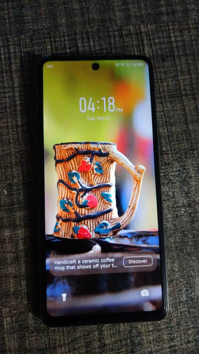Infinix Hot 40 for sale in excellent condition (Price: 33,000 PKR).