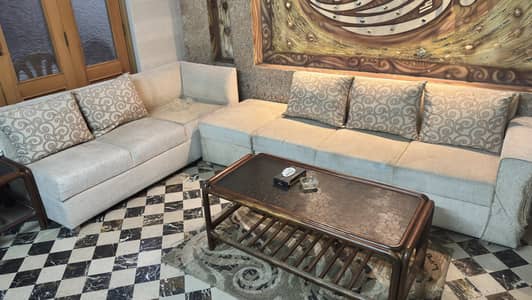 6 seater sofa set and a queen sized bed
