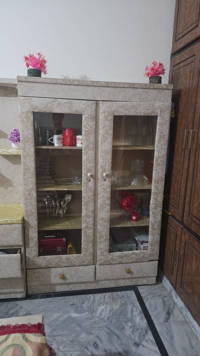 cupboard for dishes and pots