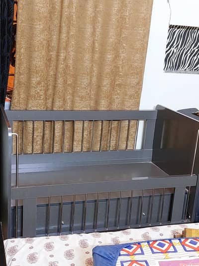 Baby cot for sale.